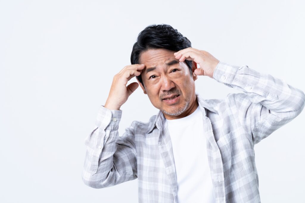 悩むミドルエイジ